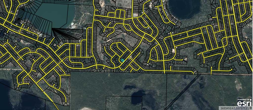 10 Shenandoah Boulevard Chipley, FL 32428 - Photo 5 of 8 an aerial view of a residential building