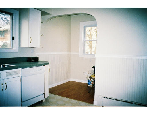 43 Hadwen Road Worcester, MA 01602 - Photo 12 of 16 a kitchen with a refrigerator and window