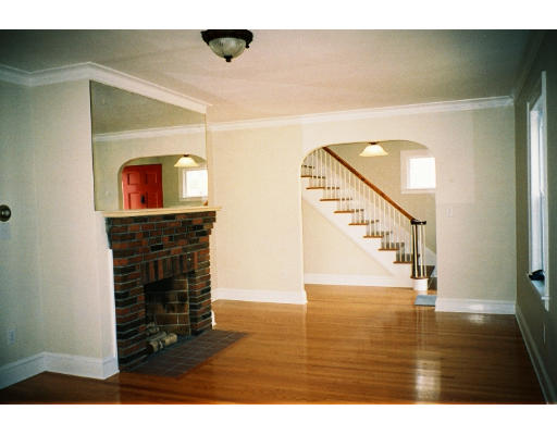 43 Hadwen Road Worcester, MA 01602 - Photo 13 of 16 a view of hallway with wooden floor and stairs