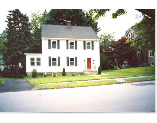 43 Hadwen Road Worcester, MA 01602 - Photo 2 of 16 a white house with a large pool in front of it