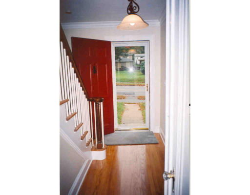 43 Hadwen Road Worcester, MA 01602 - Photo 6 of 16 a view of a hallway with wooden floor and entryway