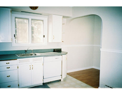 43 Hadwen Road Worcester, MA 01602 - Photo 9 of 16 a kitchen with granite countertop white cabinets and sink