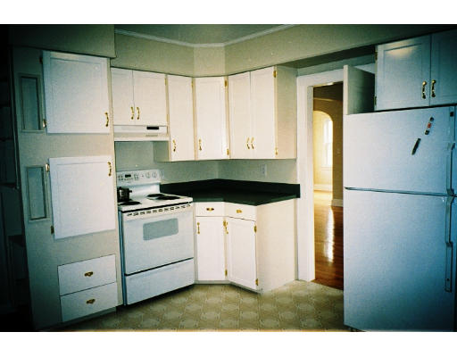 43 Hadwen Road Worcester, MA 01602 - Photo 10 of 16 a kitchen with a refrigerator and a stove