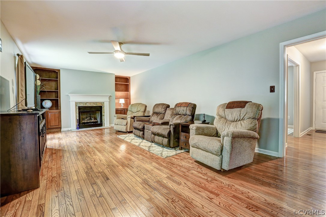 2511 Fairground Road Maidens, VA 23102 - Photo 15 of 29 a living room with furniture fireplace and flat screen tv