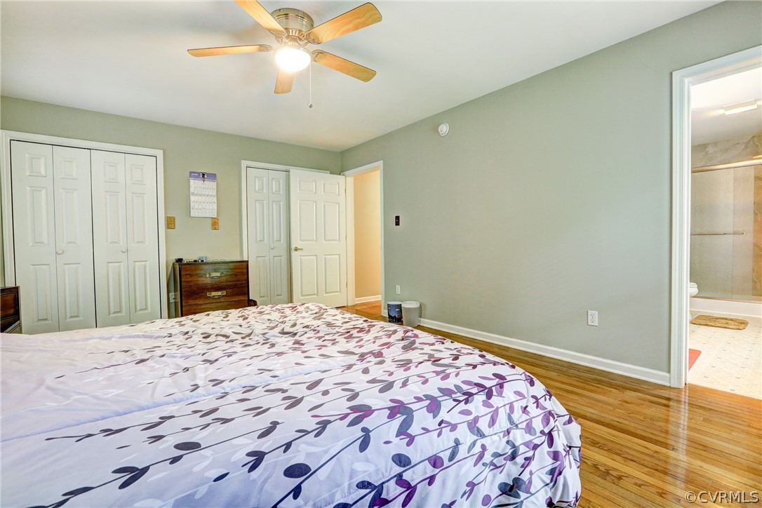 2511 Fairground Road Maidens, VA 23102 - Photo 18 of 29 a bedroom with a bed and a chandelier