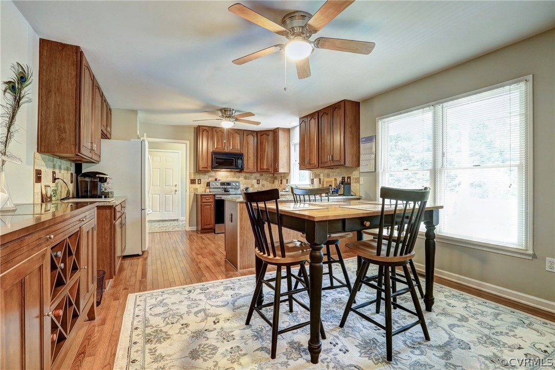 2511 Fairground Road Maidens, VA 23102 - Photo 9 of 29 a view of a dining room with furniture window and wooden floor