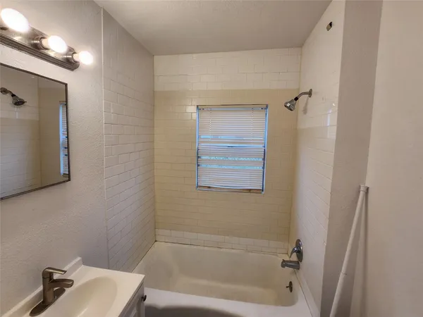 a bathroom with a bathtub
