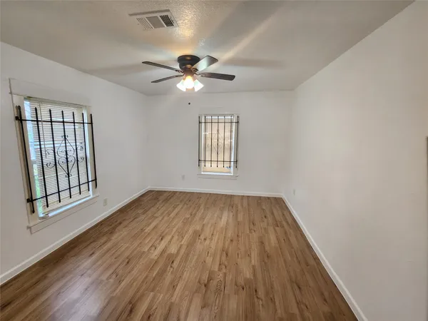 a view of a backyard with wooden floor