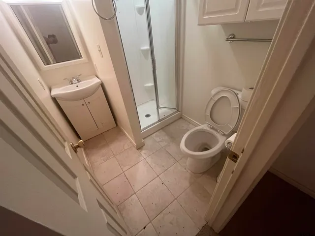 a close up of a sink and a mirror