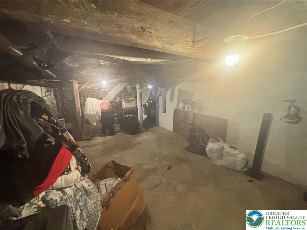 3404 North Ruch Street Whitehall, PA 18052 - Photo 30 of 36 A spacious unfinished basement offers ample storage and future development potential.