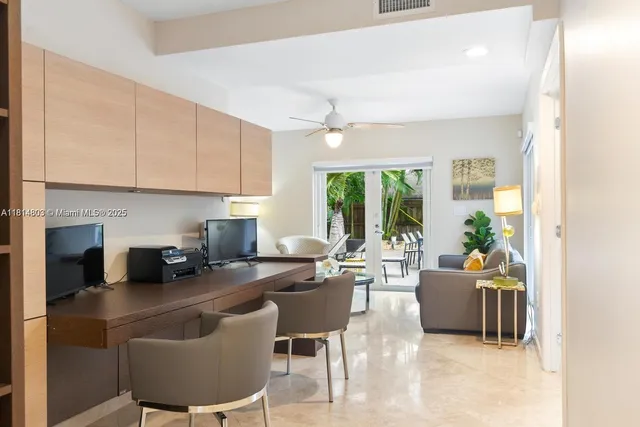 a living room with furniture and a table