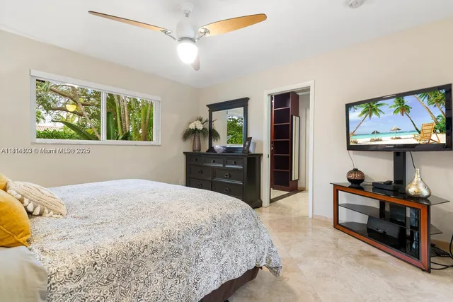 a view of bedroom and bedroom with furniture