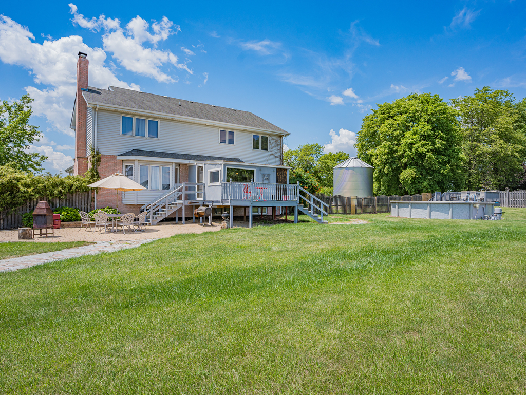 25509 South Chicago Road Elwood, IL 60421 - Photo 39 of 47 a house view with swimming pool and sitting space