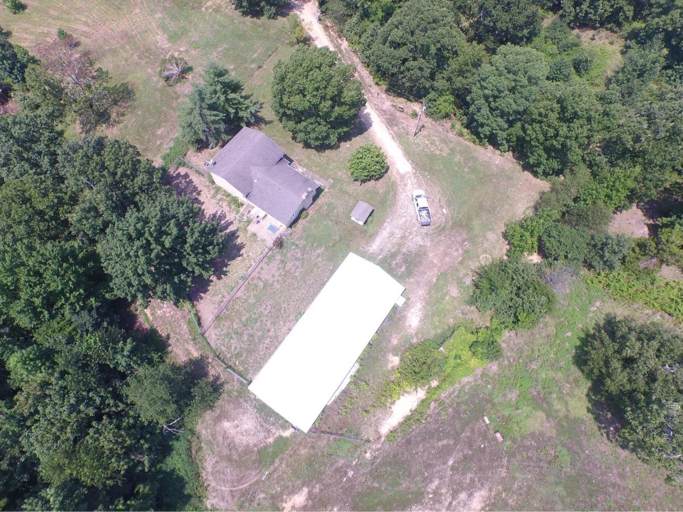 4475 Dry Ck Road Waverly, TN 37185 - Photo 17 of 29 an aerial view of a house with a yard and trees