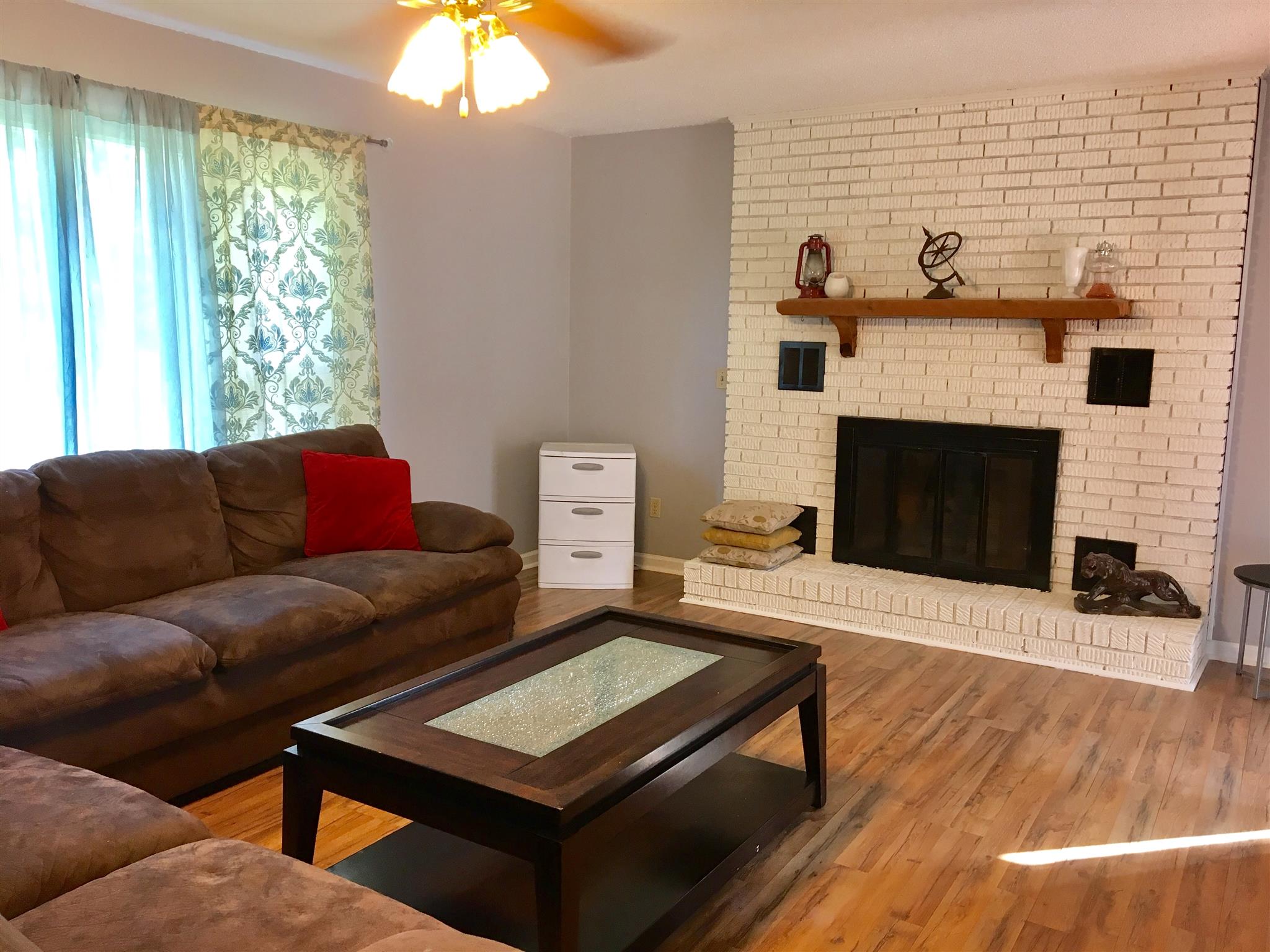 4475 Dry Ck Road Waverly, TN 37185 - Photo 10 of 29 a living room with furniture and a fireplace