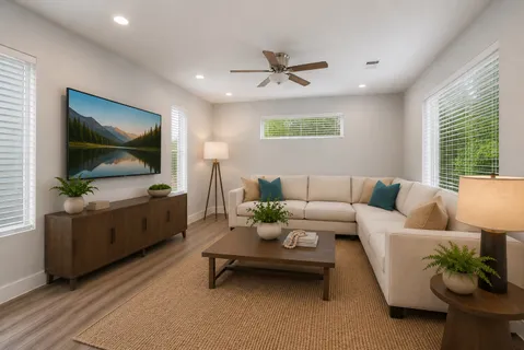 a dining room with furniture and window