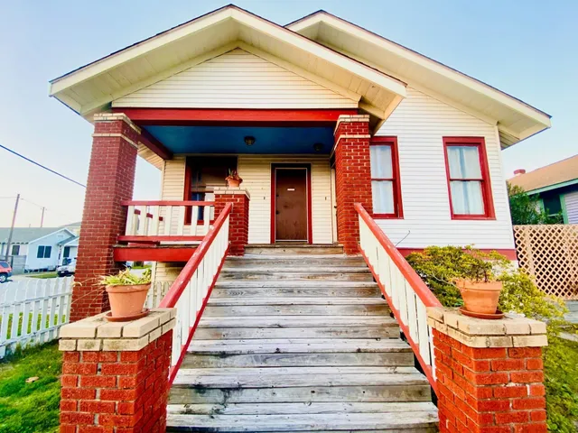a view of a house with large windows