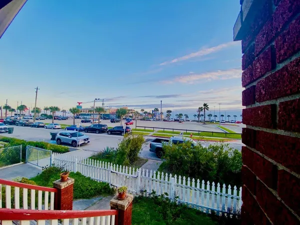 a view of swimming pool yard and outdoor seating