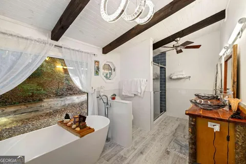 a bathroom with a sink and mirror