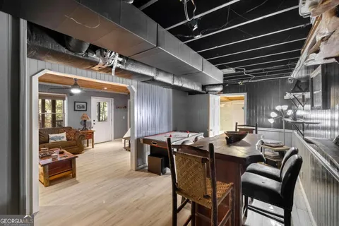 a view of a chairs and table in a room