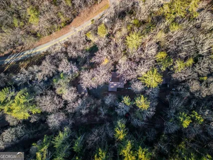 a view of a town with mountains in the background