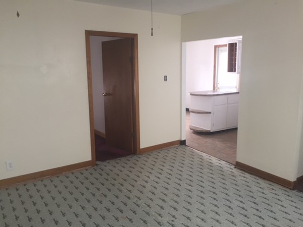 650 Third Street Fall River, MA 02721 - Photo 9 of 30 a view of empty room with wooden floor