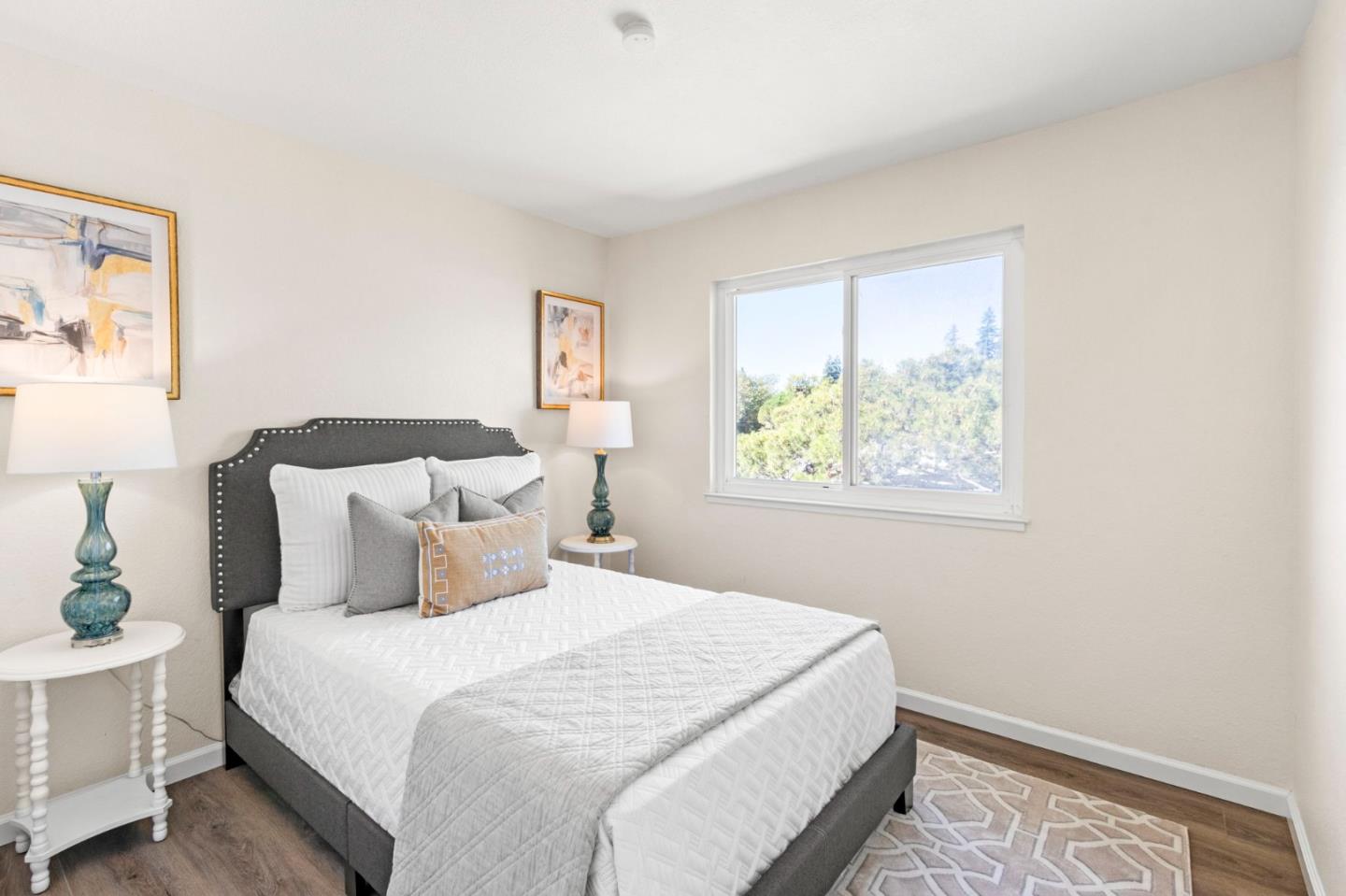 643 Foster Court, Unit 4 Hayward, CA 94544 - Photo 13 of 20 a bedroom with a bed and a window