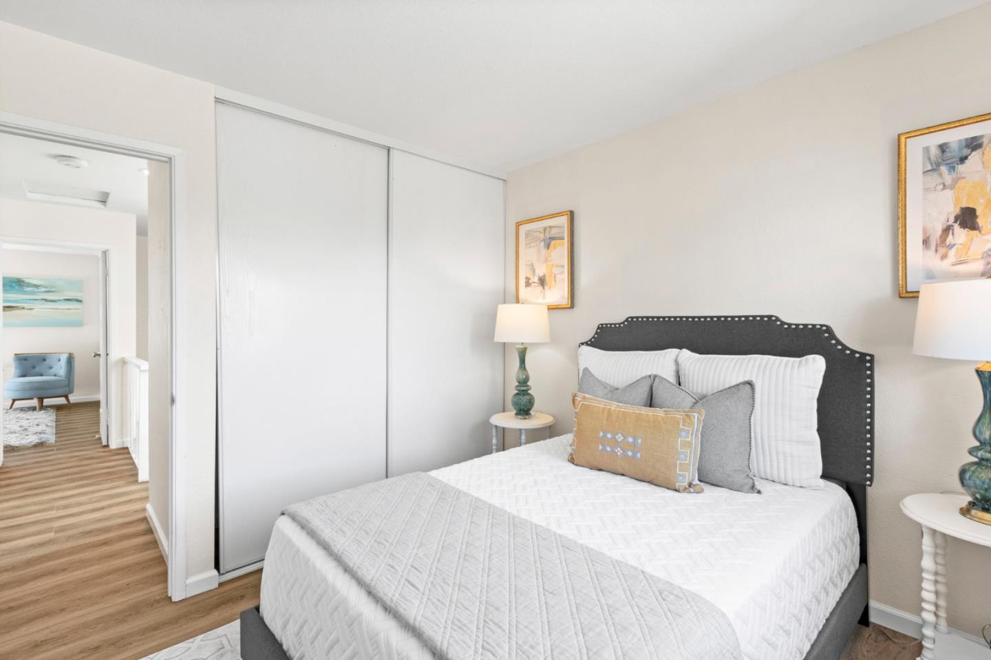 643 Foster Court, Unit 4 Hayward, CA 94544 - Photo 14 of 20 a bedroom with a bed and wooden floor