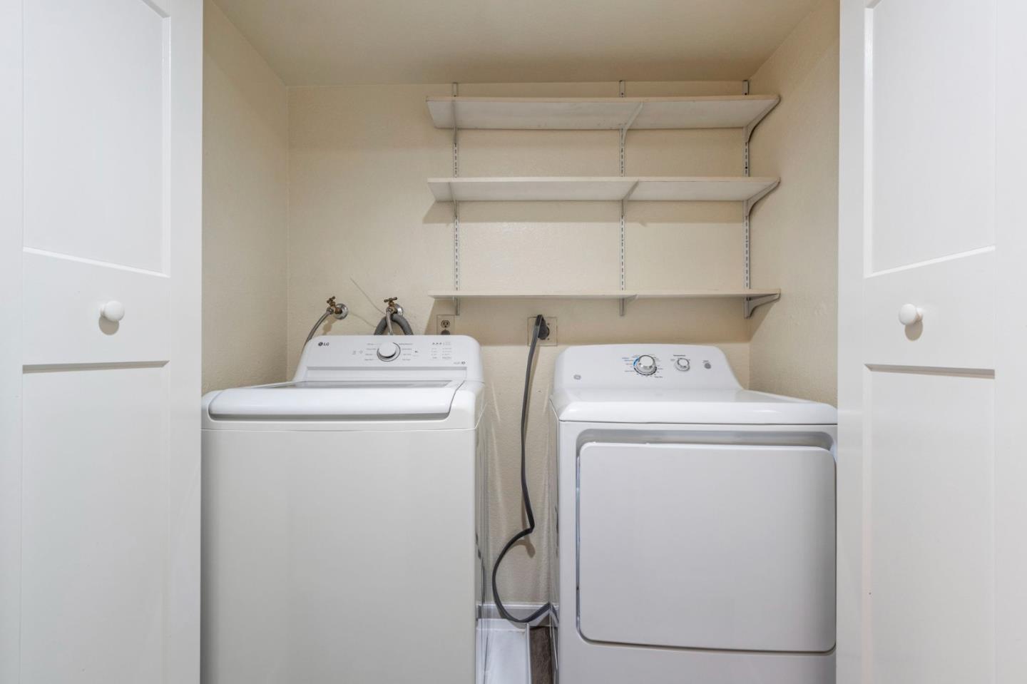 643 Foster Court, Unit 4 Hayward, CA 94544 - Photo 17 of 20 a utility room with dryer and washer