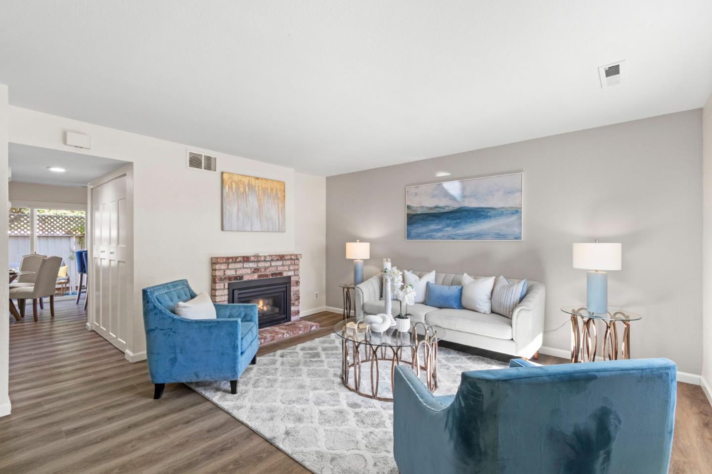 643 Foster Court, Unit 4 Hayward, CA 94544 - Photo 4 of 20 a living room with furniture and a fireplace