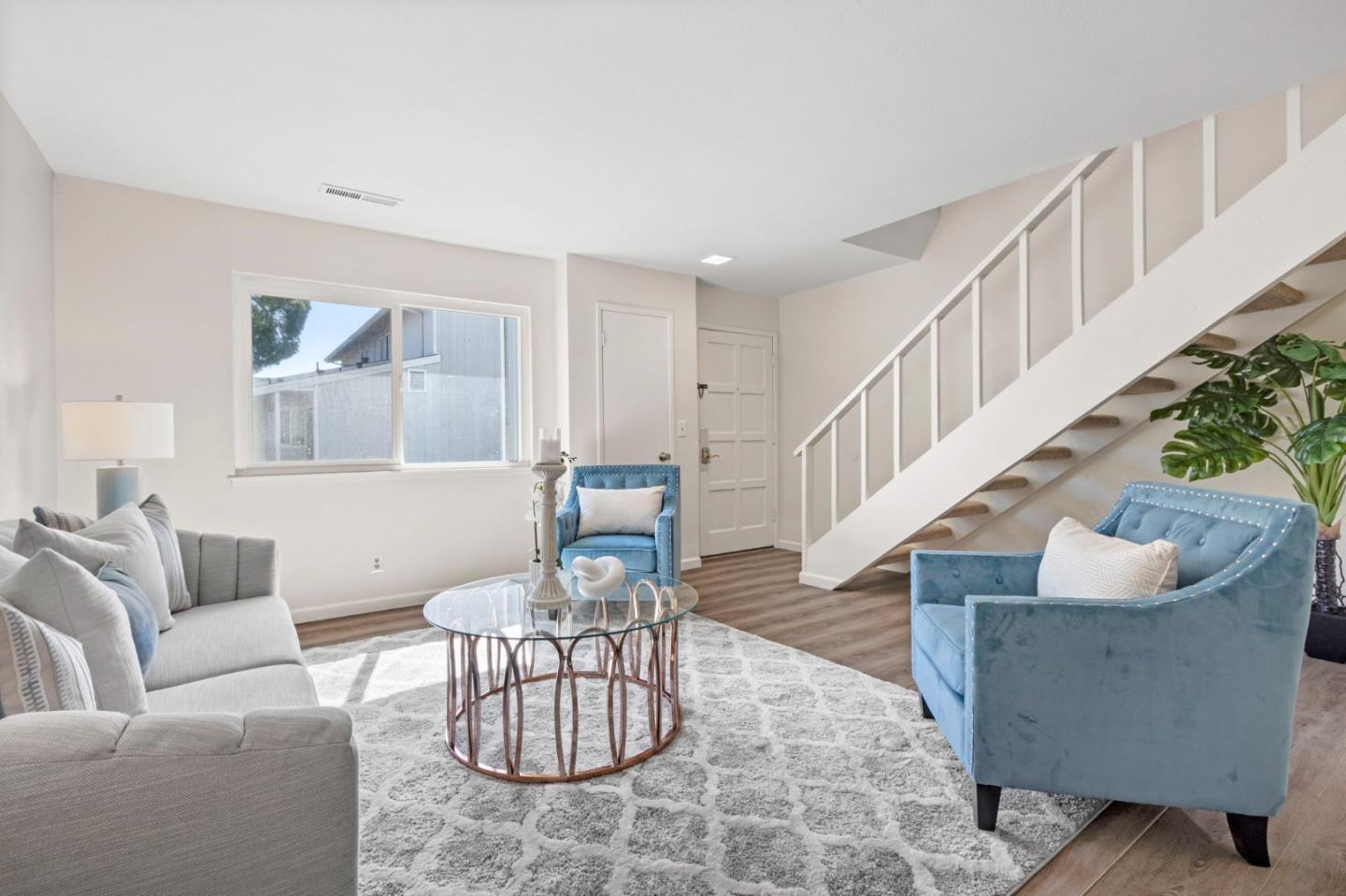 643 Foster Court, Unit 4 Hayward, CA 94544 - Photo 5 of 20 a living room with furniture and a potted plant