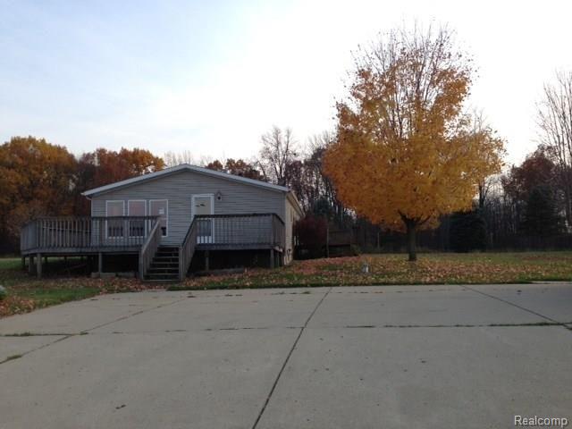10562 Godfrey Road Morrice, MI 48857 - Photo 2 of 22 side exterior.jpg