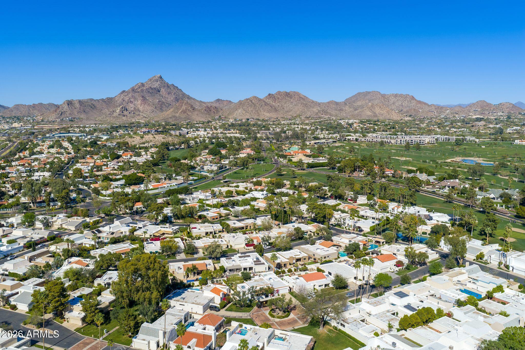 5201 North 24th Street, Unit 107 Phoenix, AZ 85016 - Photo 14 of 15 an aerial view of residential houses with outdoor space and trees