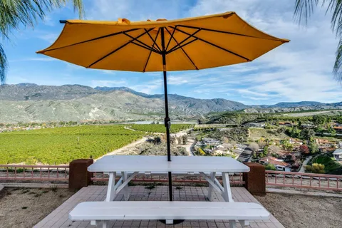 a view of a terrace with a garden
