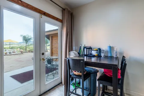 a kitchen that has a lot of appliances in it