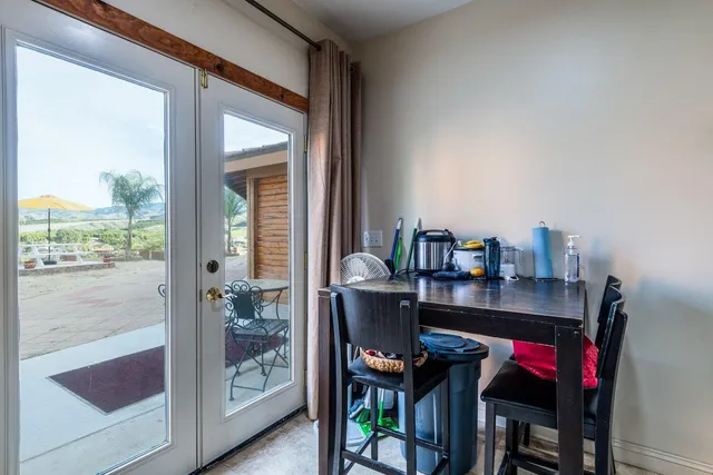 a kitchen that has a lot of appliances in it