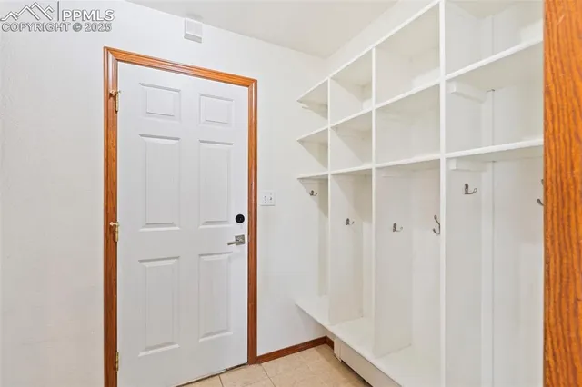 a view of closet area with empty racks