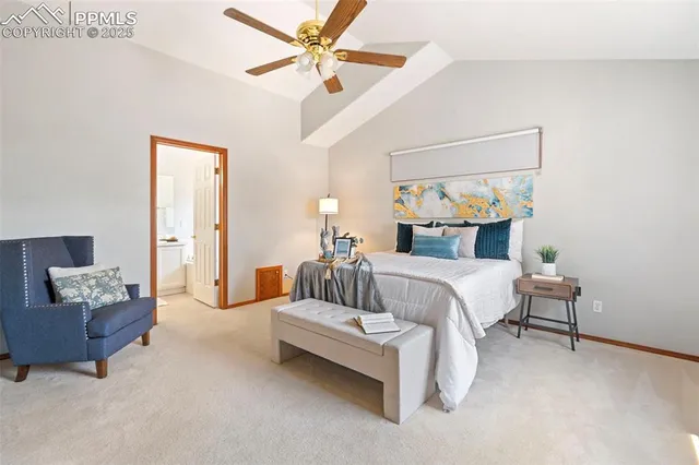 a bedroom with a bed and a couch