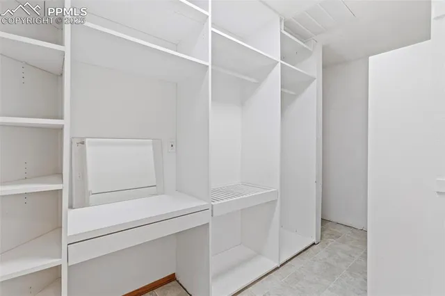 a view of an empty walk in closet