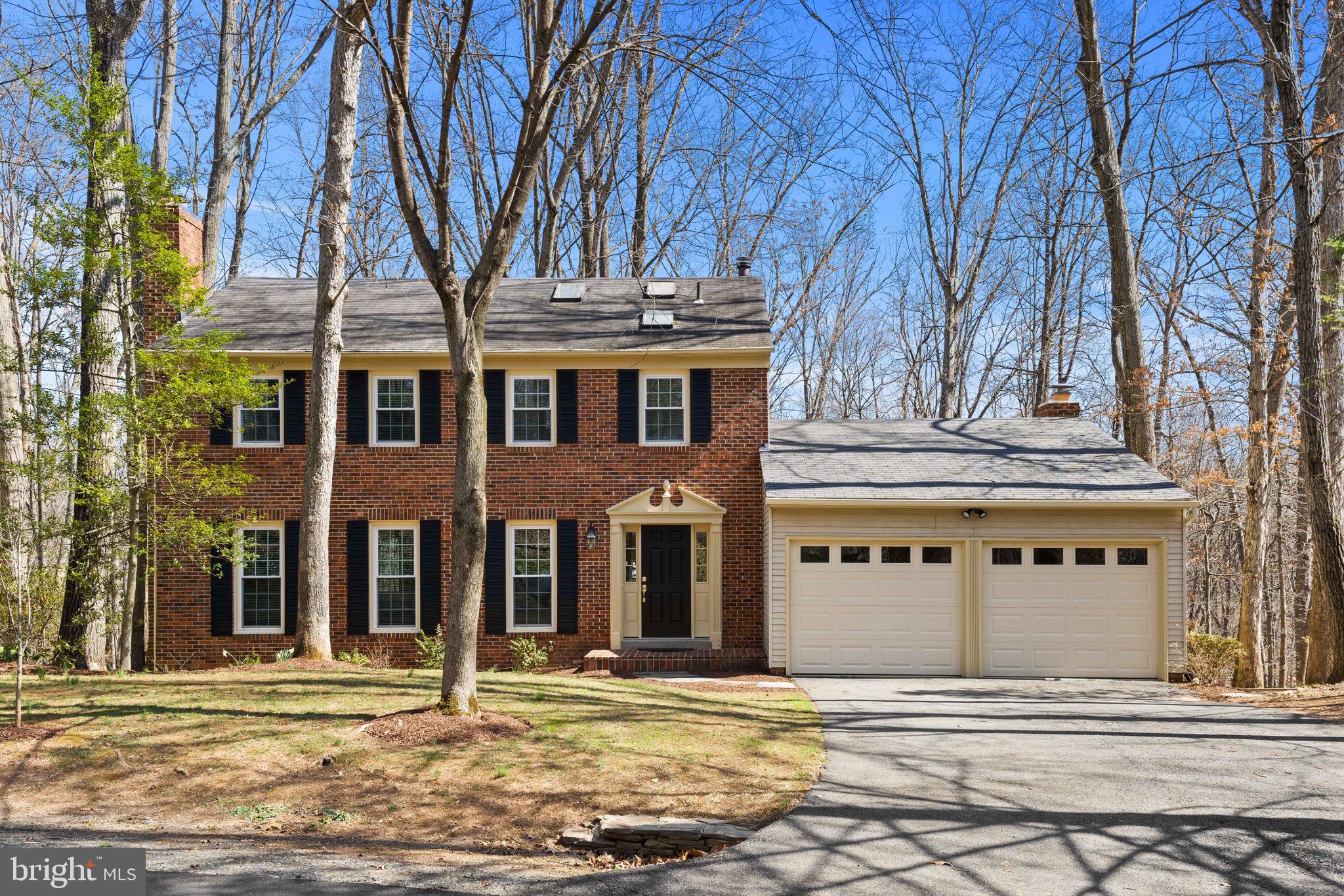 front view of a building with a fountain