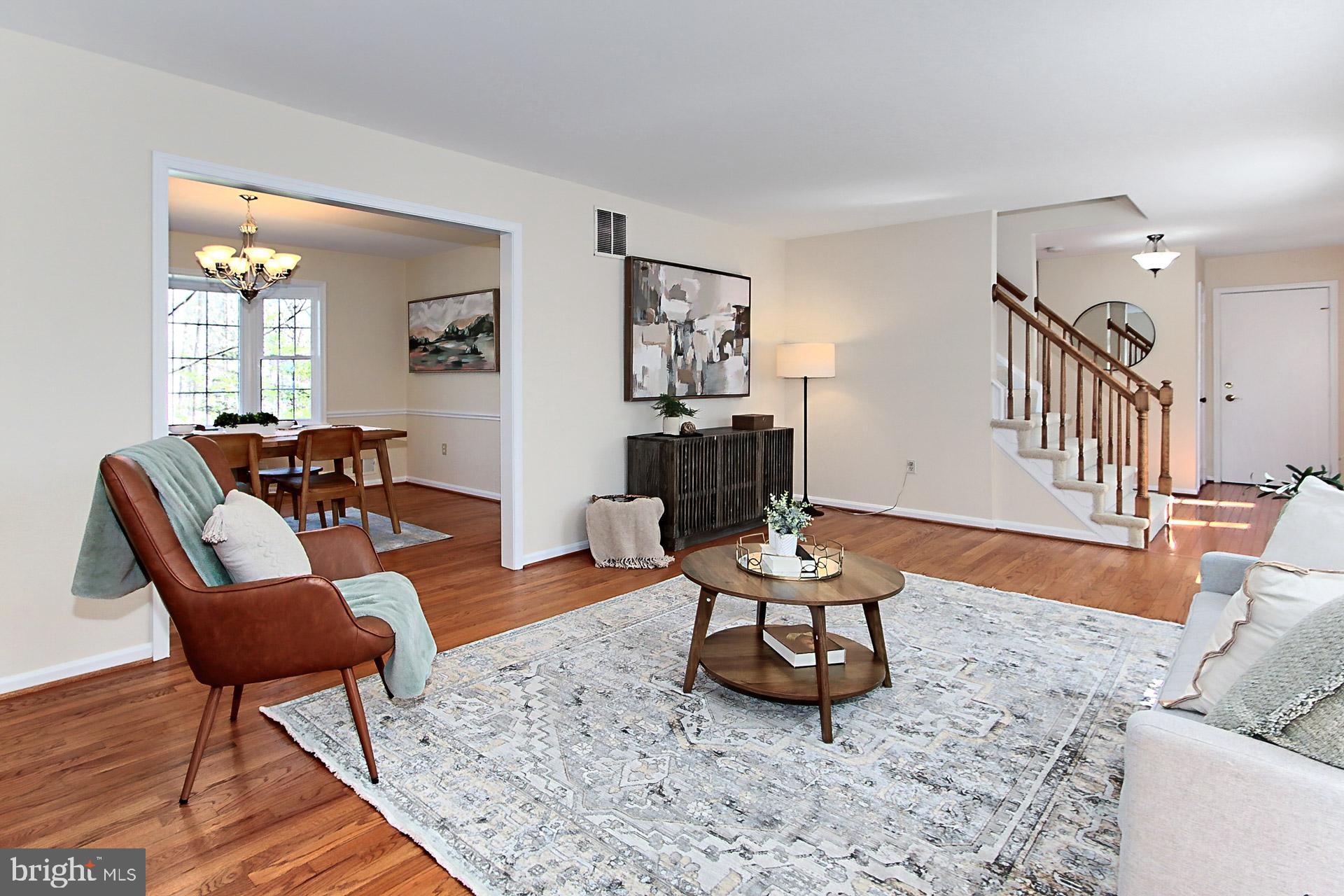 10704 Cross School Road Reston, VA 20191 - Photo 17 of 56 a living room with furniture and a rug