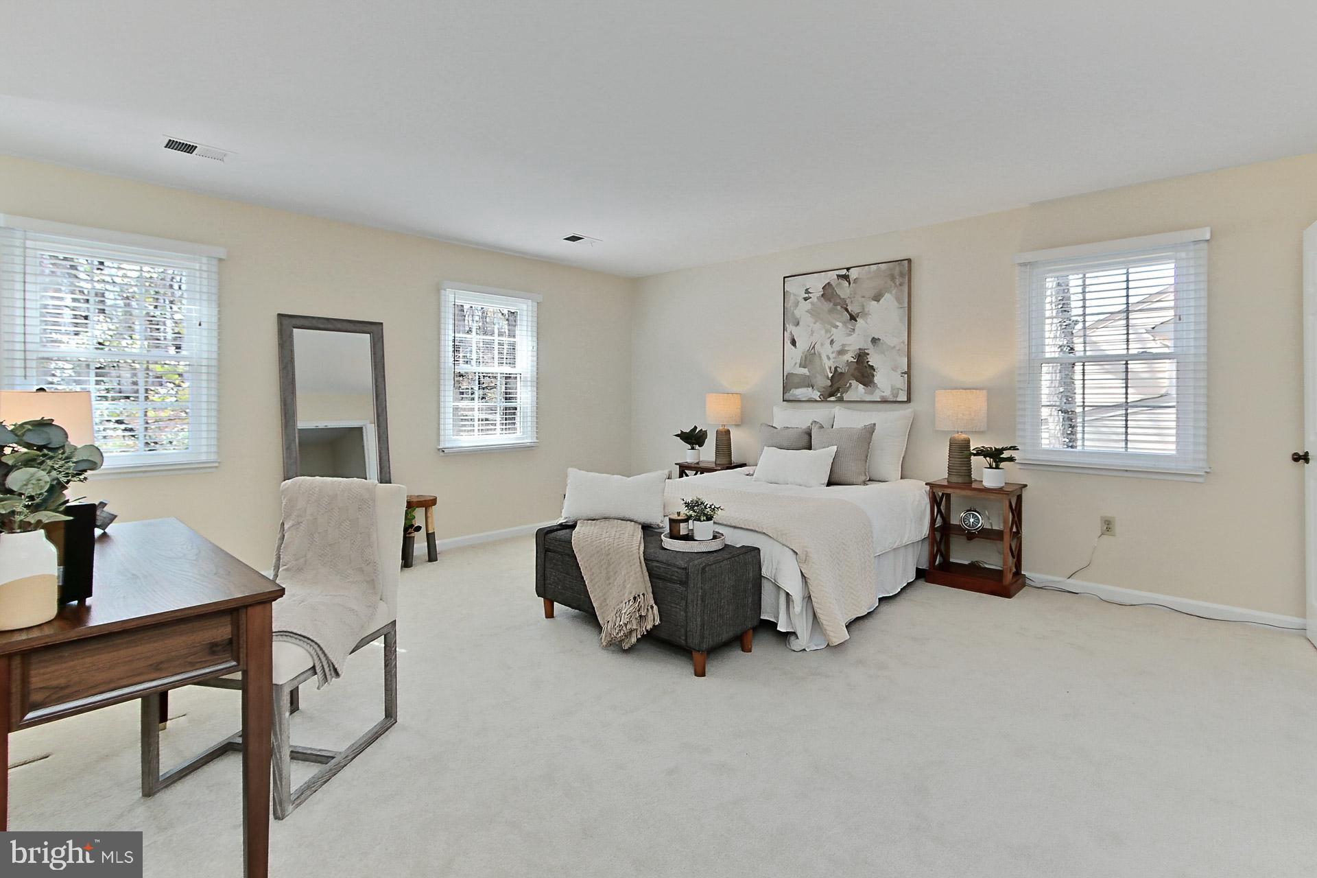 10704 Cross School Road Reston, VA 20191 - Photo 19 of 56 a bedroom with furniture and a window