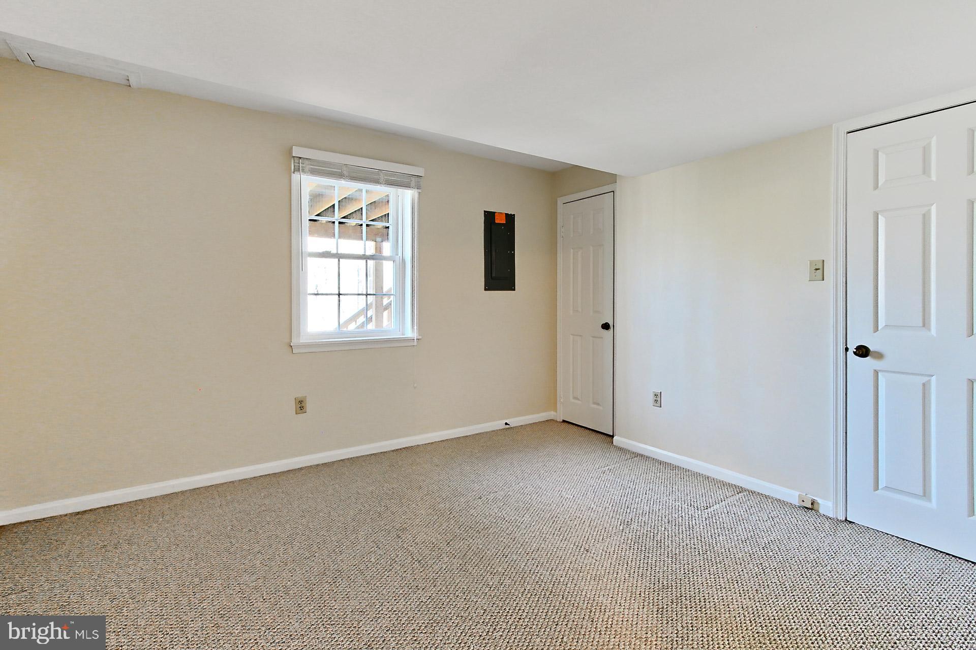 10704 Cross School Road Reston, VA 20191 - Photo 35 of 56 an empty room with windows