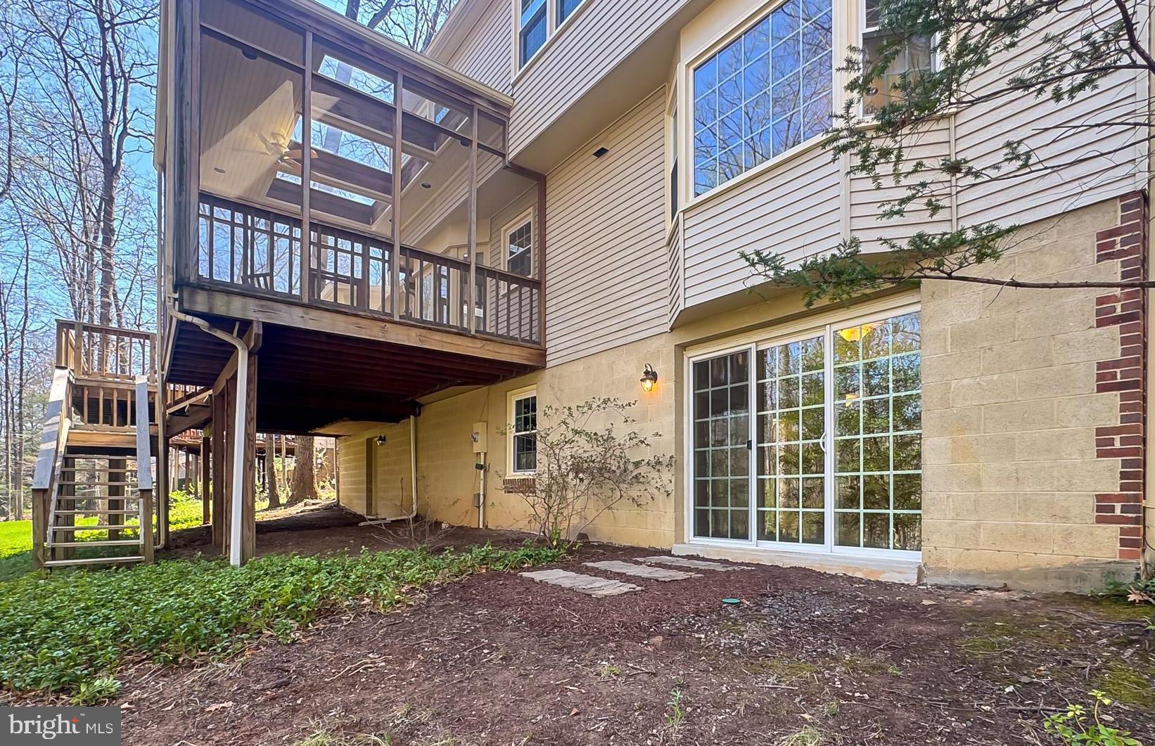 10704 Cross School Road Reston, VA 20191 - Photo 45 of 56 a view of a house with a yard
