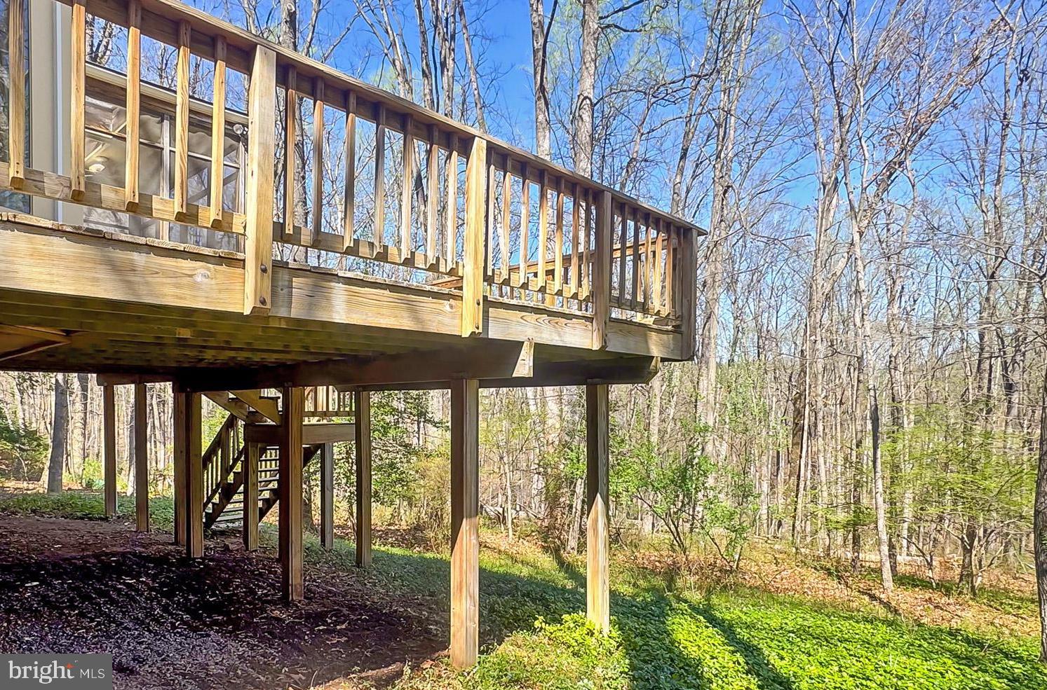 10704 Cross School Road Reston, VA 20191 - Photo 47 of 56 a view of a porch with wooden floor and fence