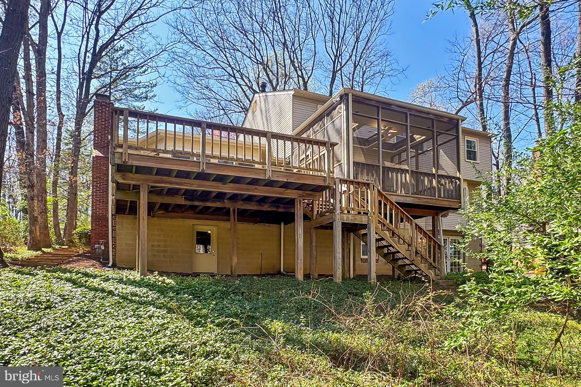 10704 Cross School Road Reston, VA 20191 - Photo 48 of 56 a view of a house with a yard