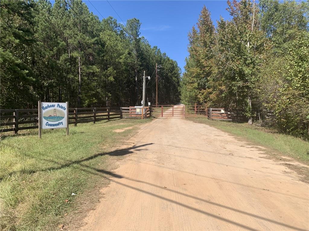 0 Harbour Pointe Pointe, Unit POINTE Sparta, GA 31087 - Photo 13 of 16 a view of a backyard with sitting area
