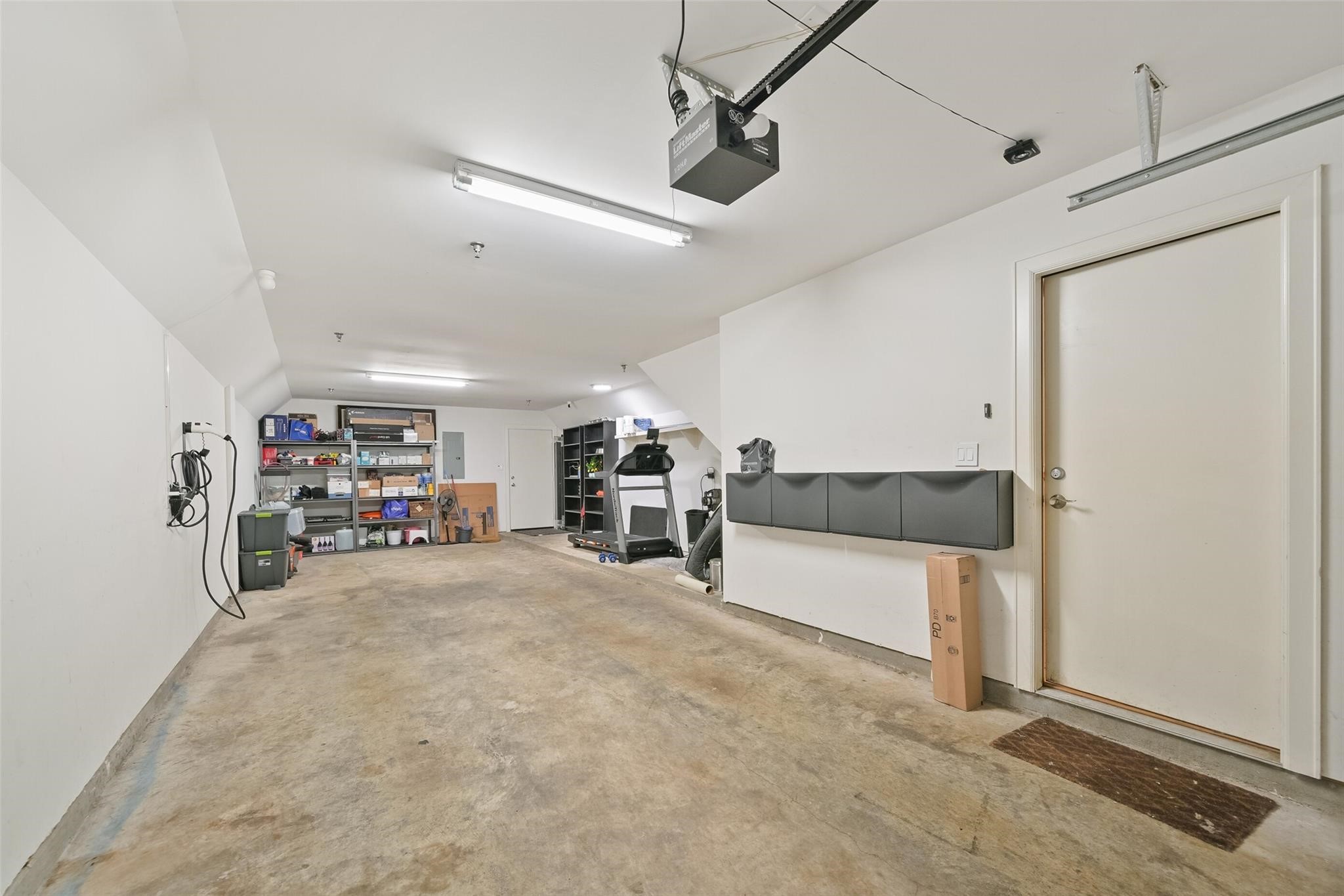 8715 Meadowcroft Drive, Unit 1002 Houston, TX 77063 - Photo 21 of 24 a view of a livingroom with furniture and a ceiling fan