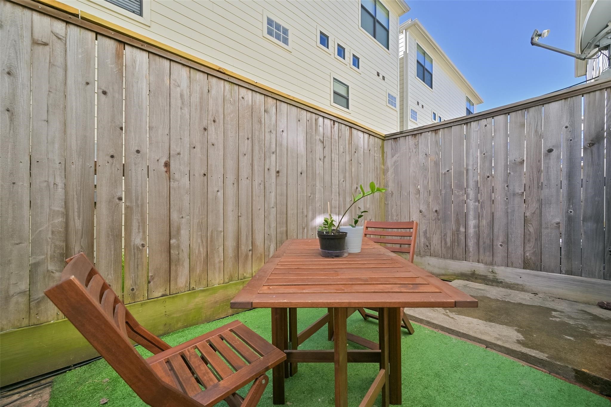 8715 Meadowcroft Drive, Unit 1002 Houston, TX 77063 - Photo 22 of 24 a view of outdoor seating space