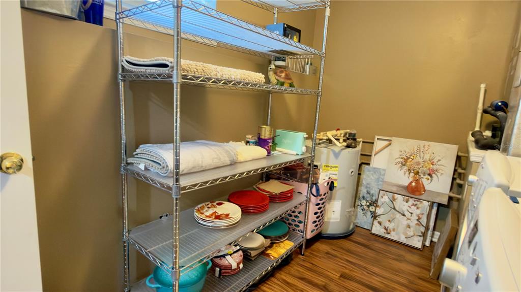 6624 Time Square Avenue, Unit 102 Orlando, FL 32835 - Photo 42 of 96 a bedroom with a bed and a table